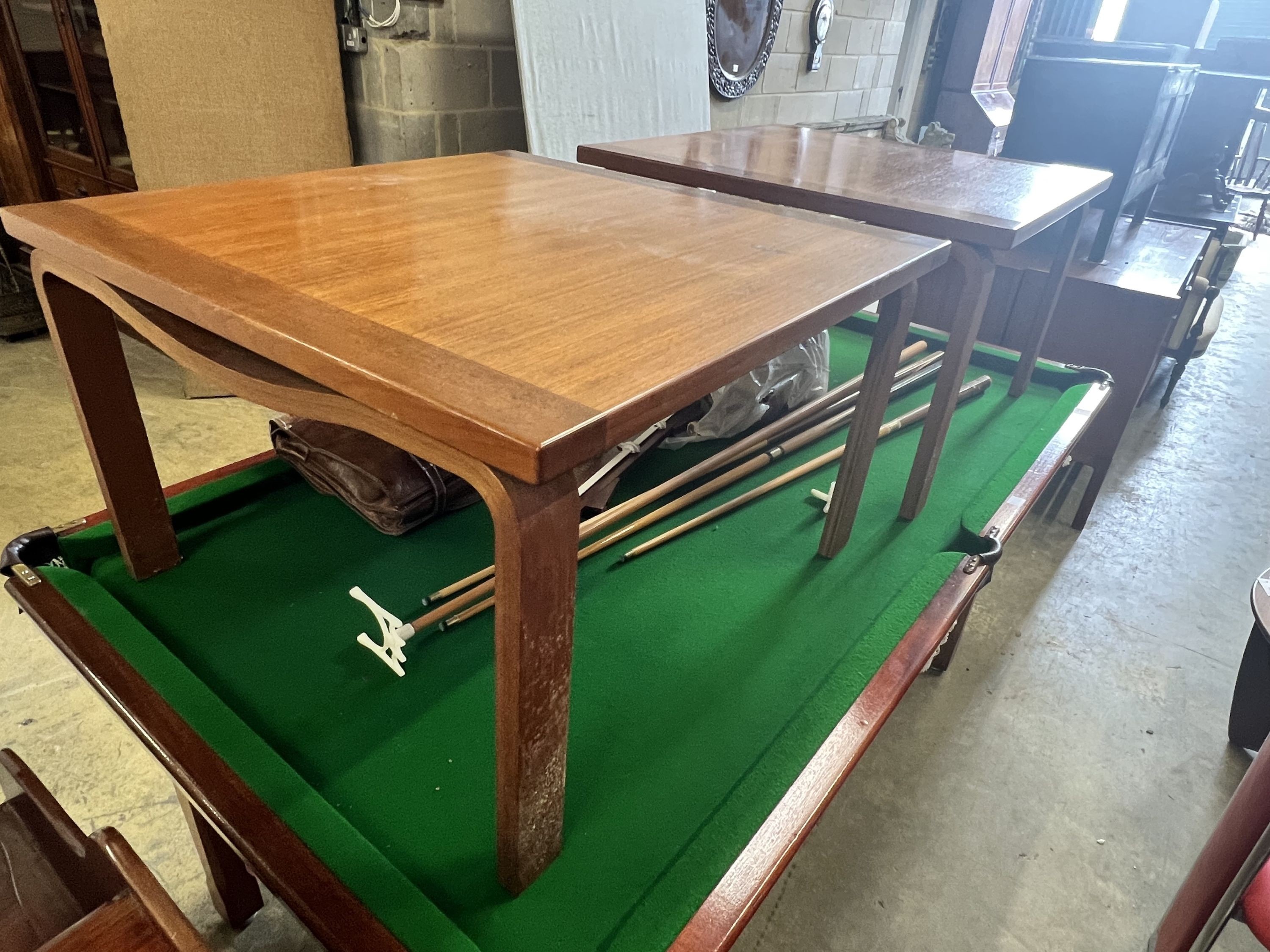 A pair of 1950's Danish teak coffee tables, width 76cm depth 76cm height 47cm